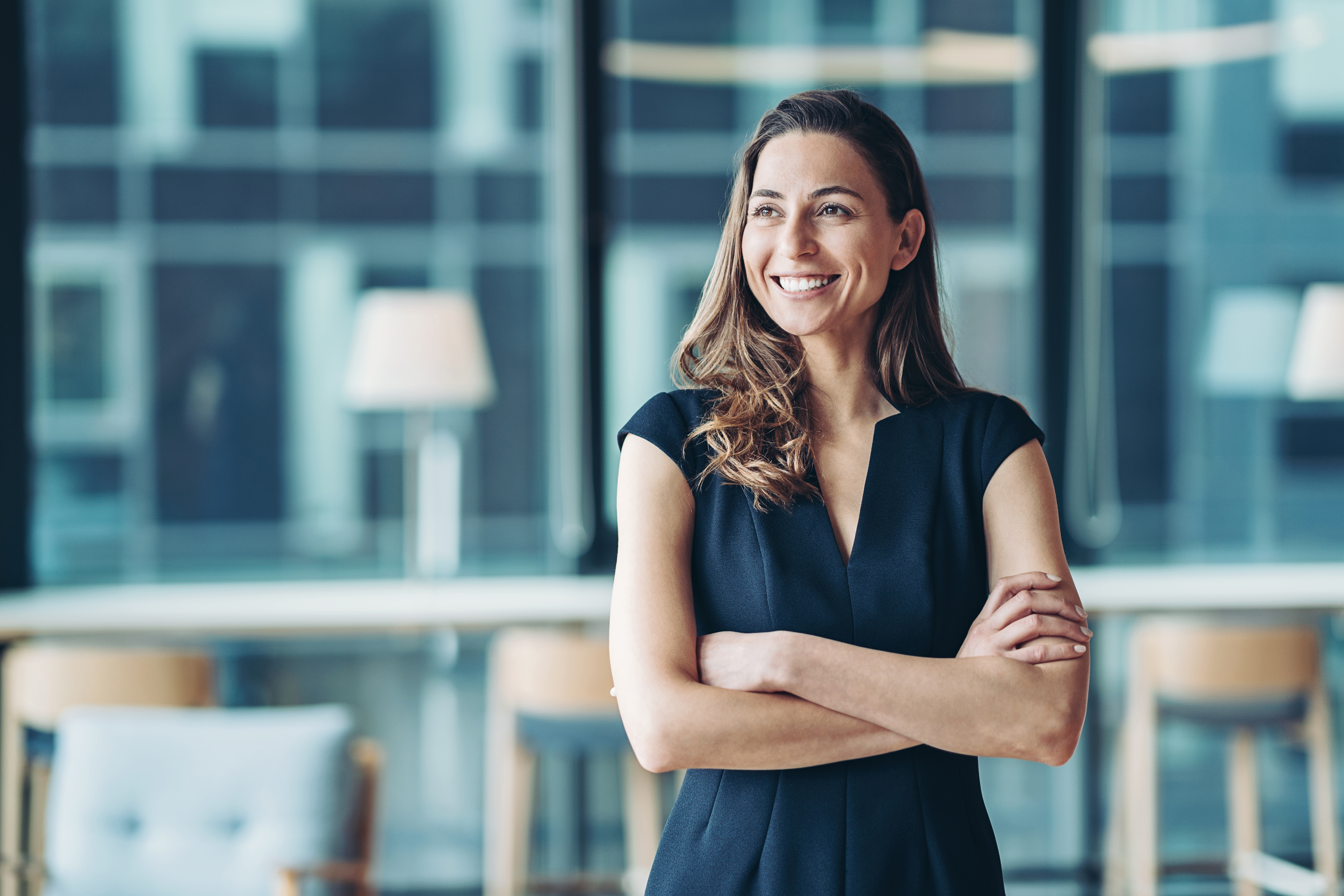 Portrait of a businesswoman standing in a a modern office