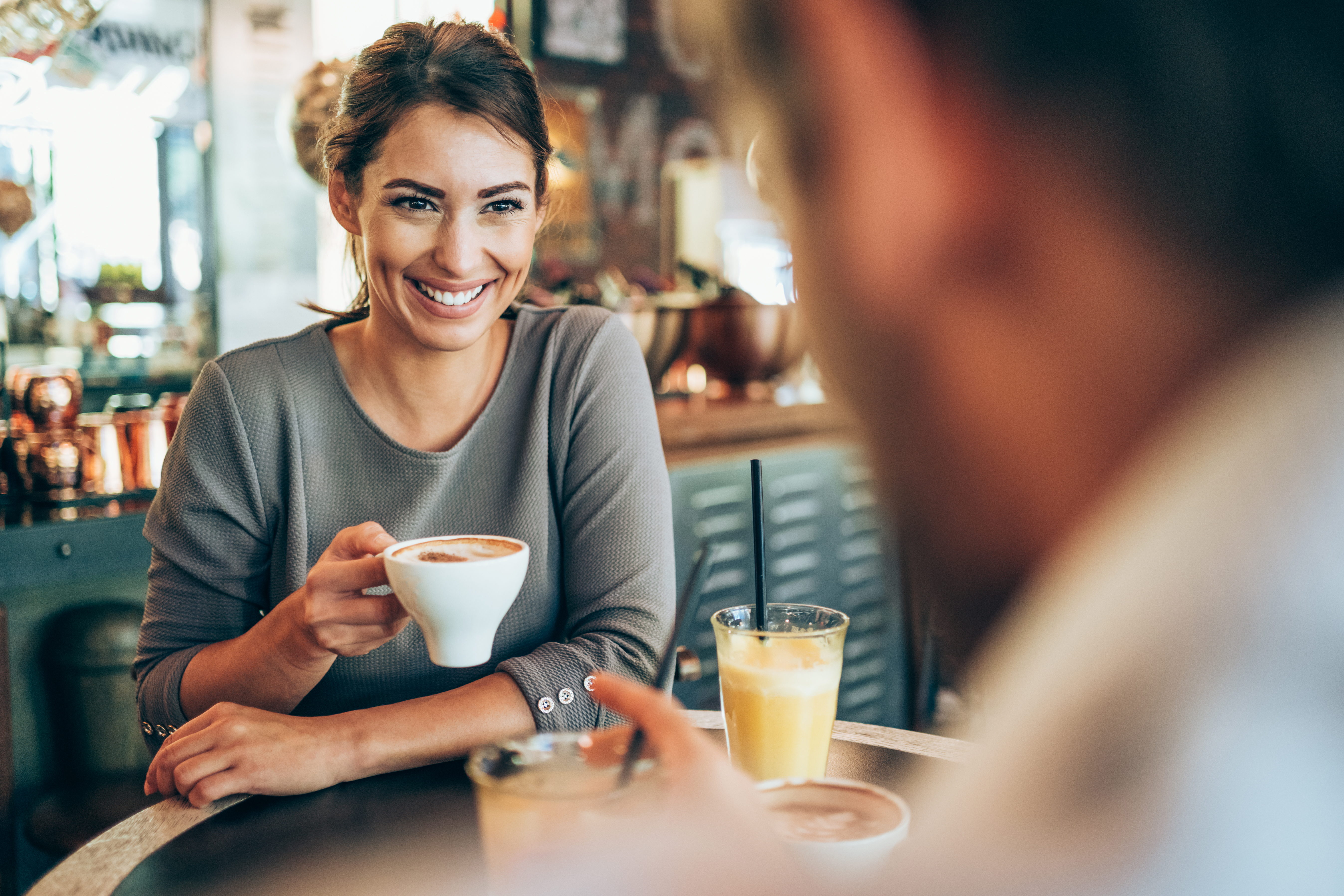 Lovely couple having date in a cafe.