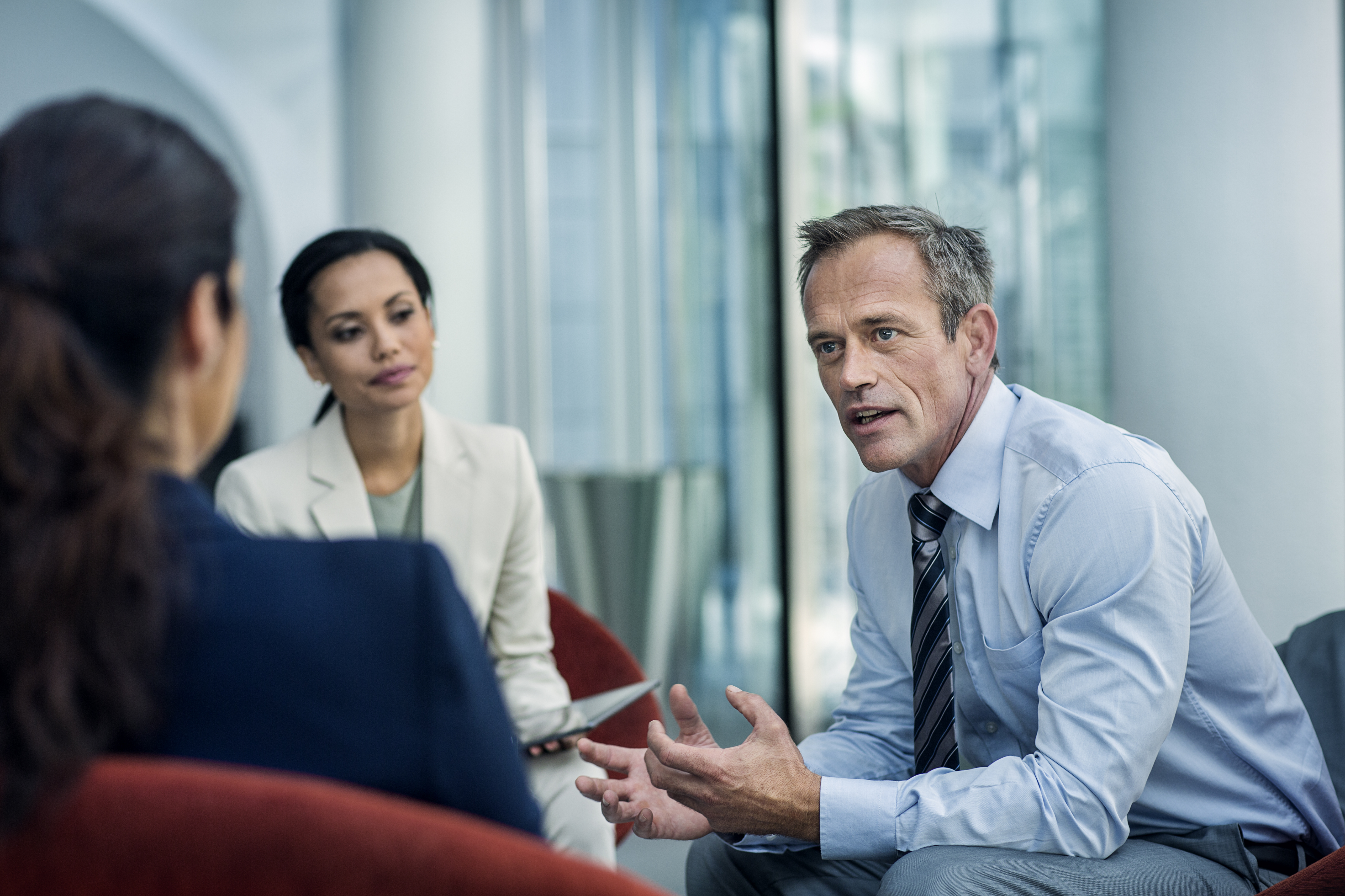 Businessman discussing strategy with colleagues