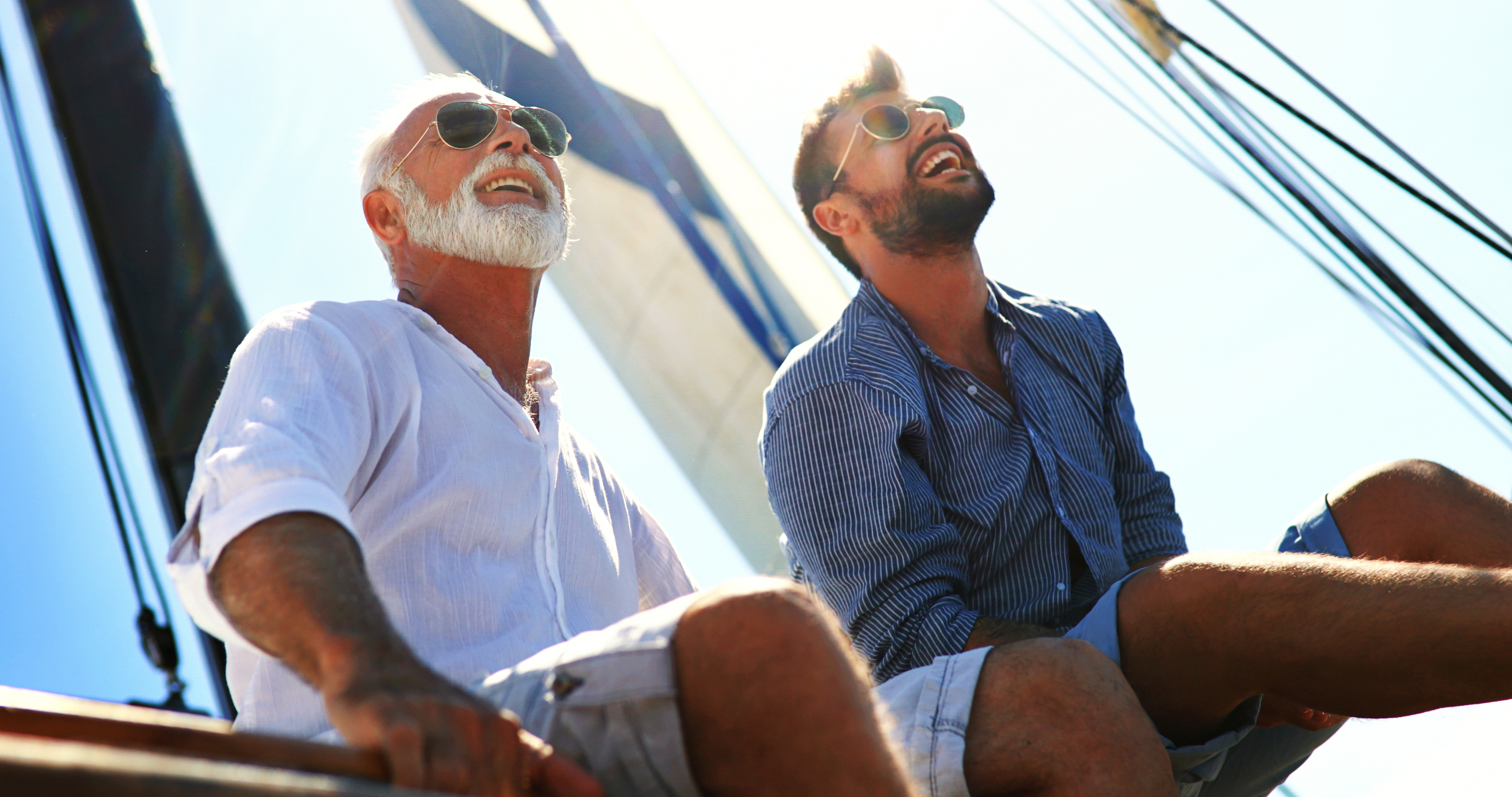 Father and son sailing.